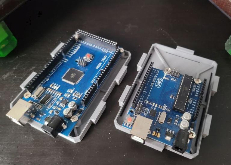 arduino uno and mega screwed to inserts
